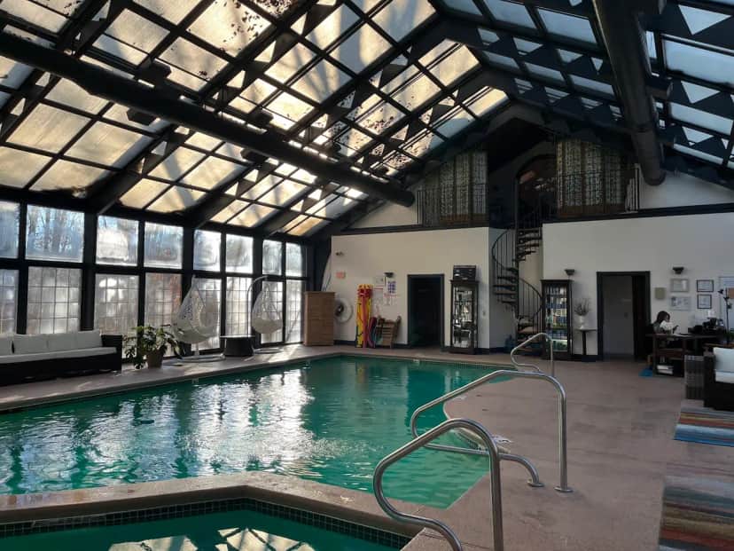 Shared indoor hot tub at Chateau Merrimack Resort & Spa