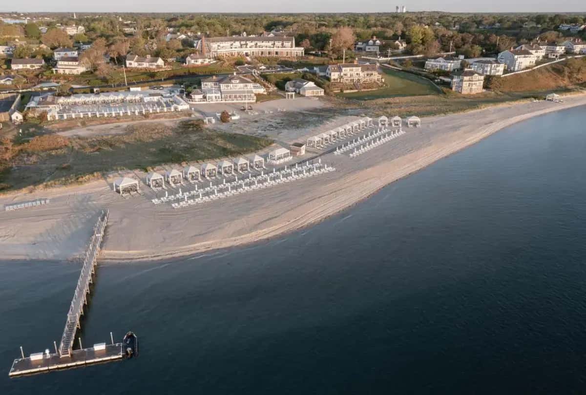 an aerial view of a beach with a pier at Chatham Bars Inn in Chatham