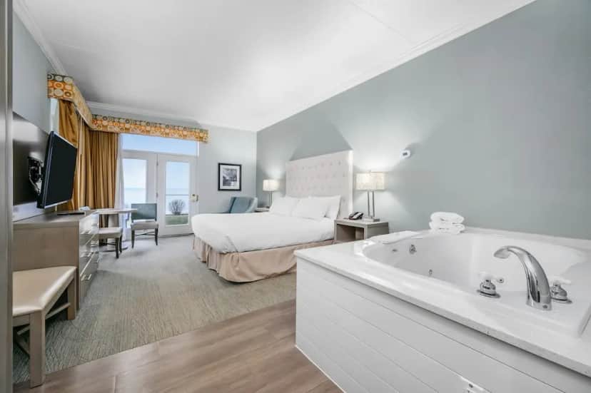 Private in-room jacuzzi in the Lake Charlevoix Studio - One King at Cherry Tree Inn & Suites