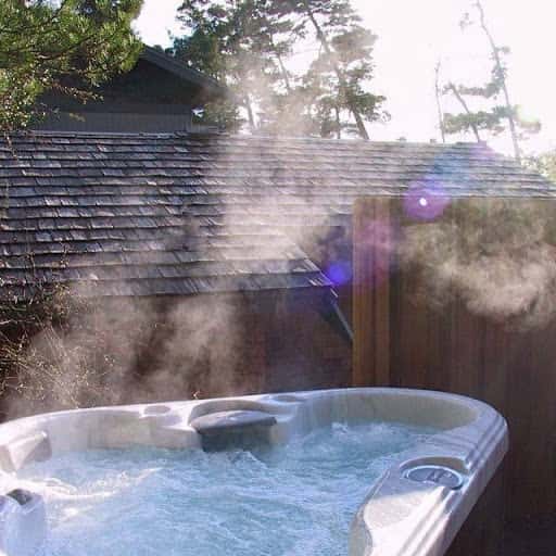 Private outdoor hot tub at Coast Cabins in Manzanita, OR