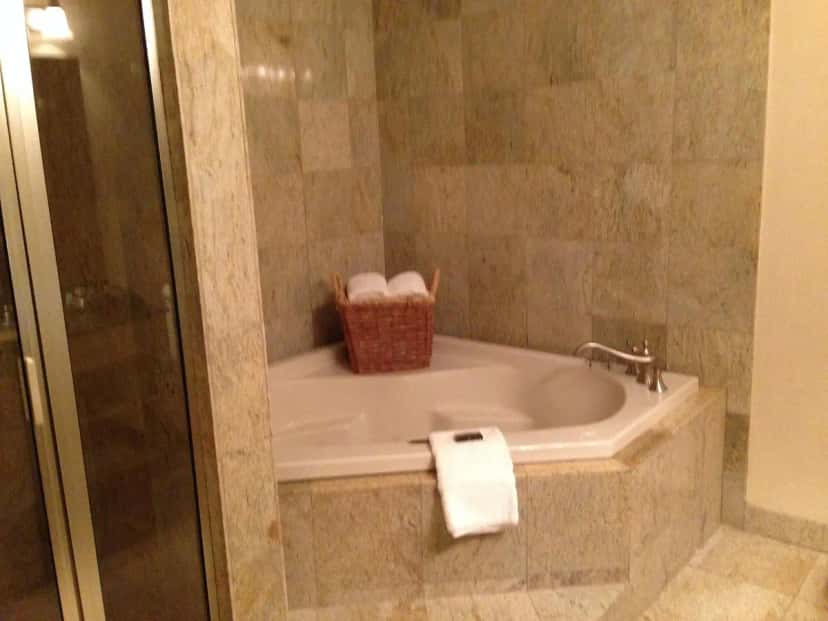 In-room hot tub at Collegian Hotel & Suites, Trademark Collection By Wyndham in Syracuse, NY