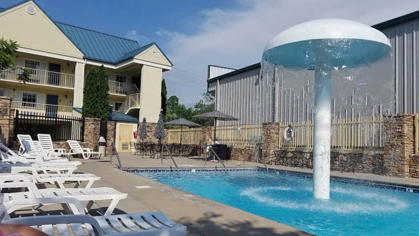 Shared outdoor hot tub at Colonial House Motel
