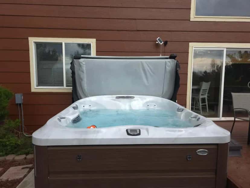 Private outdoor hot tub at Colorado Cottage W/Mountain View in Colorado Springs, CO