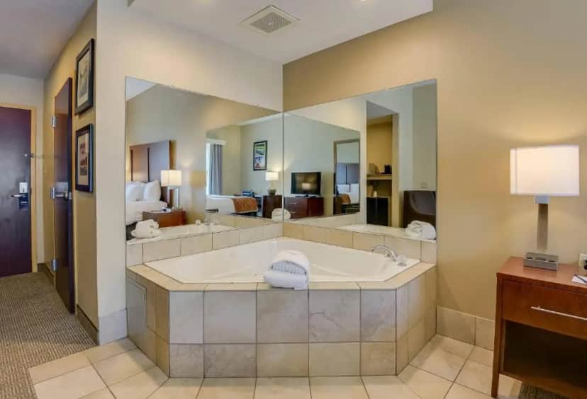 Private in-room jacuzzi tub in the King Room with Whirlpool - Non-Smoking at Comfort Inn & Suites Augusta Fort Gordon Area