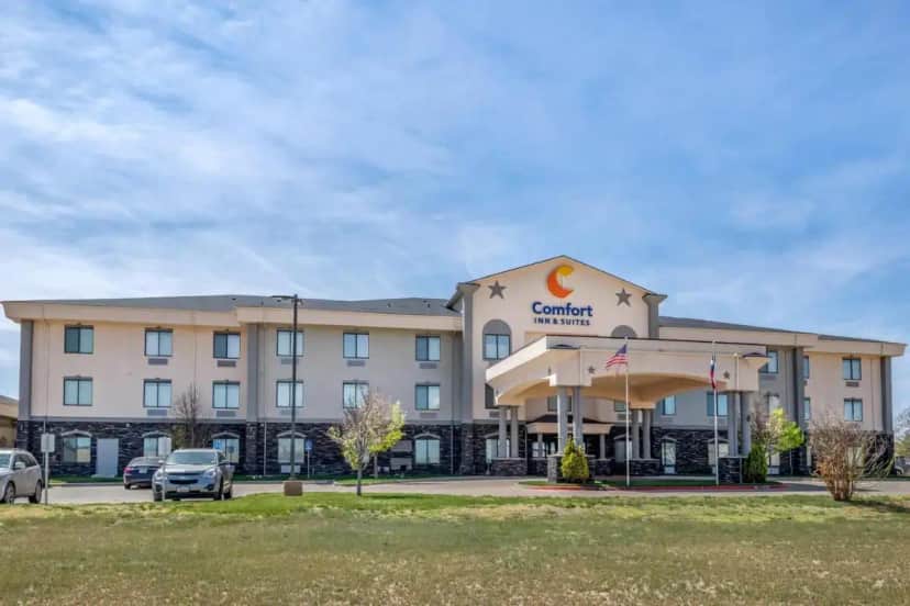 a hotel with a car parked in front of it at Comfort Inn & Suites Lubbock West in Lubbock