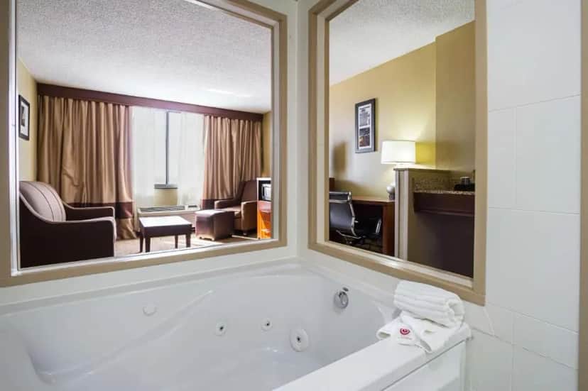 Private in-room jacuzzi in the Deluxe King Suite at Comfort Inn Downtown