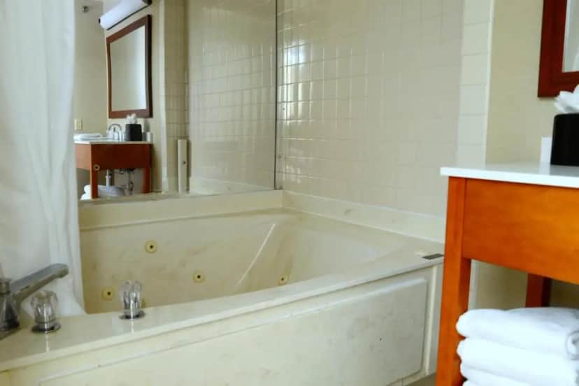 Private in-room jacuzzi tub in the King Suite with Whirlpool - Non smoking at Comfort Inn University Durham-Chapel Hill