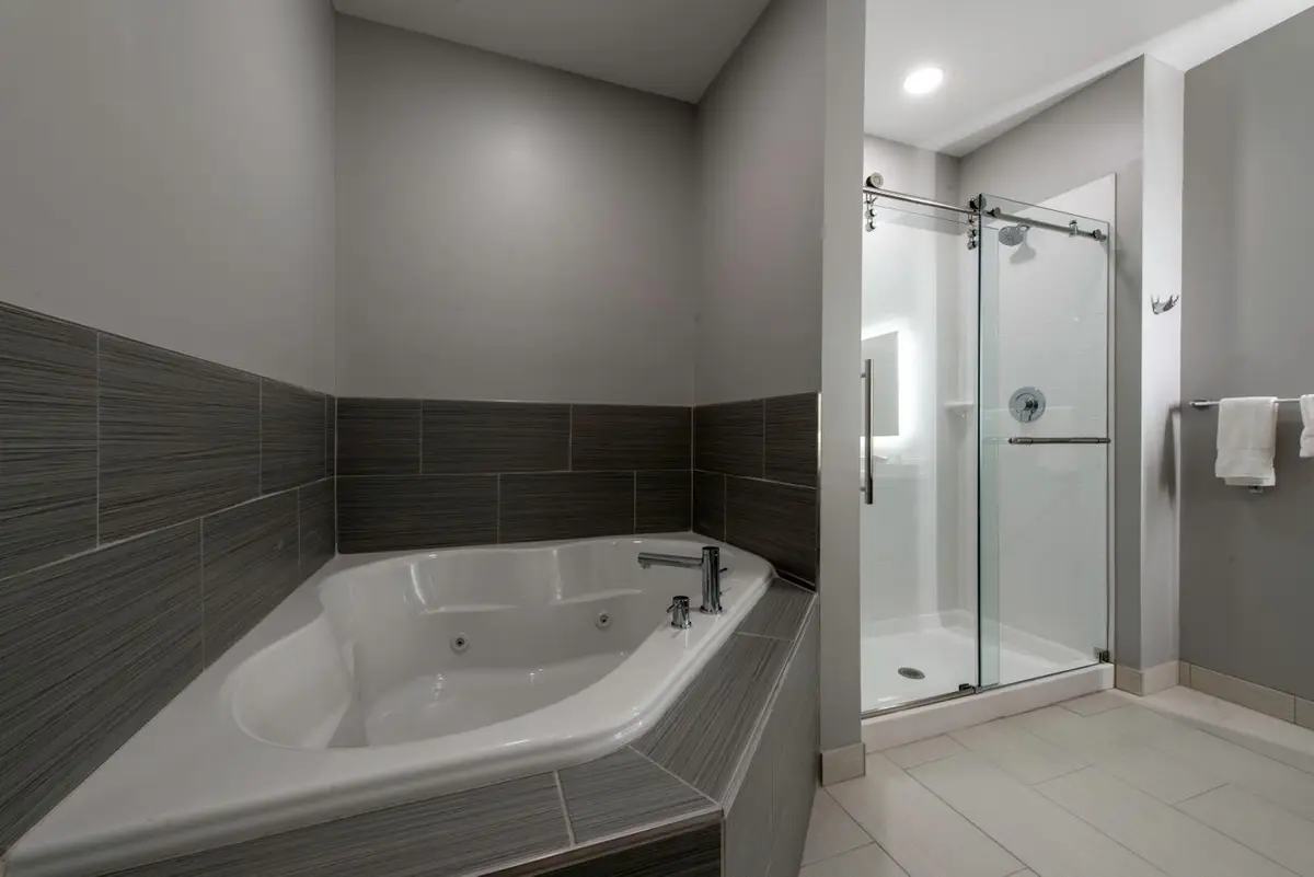 Private in-room jacuzzi tub in the King Suite with Whirlpool - Non-Smoking at Comfort Suites Greenville Airport