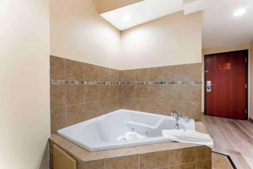 Private in-room jacuzzi tub in the Presidential Suite, 1 King Bed, Non Smoking, Jetted Tub at Comfort Suites