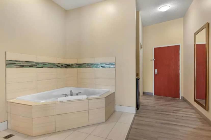 Private in-room jacuzzi tub in the King Suite with Spa Bath at Comfort Suites South Bend Near Casino