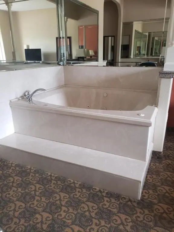 Private in-room jacuzzi tub in the Superior King Suite with Hot Tub - Non-Smoking at Comfort Suites Westchase Houston Energy Corridor