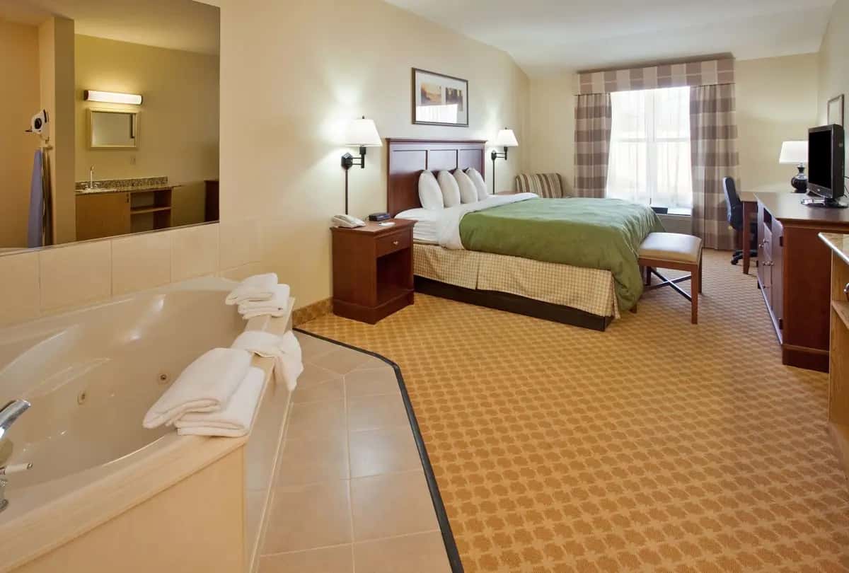 Private in-room jacuzzi tub at Country Inn & Suites by Radisson, Birch Run-Frankenmuth, MI