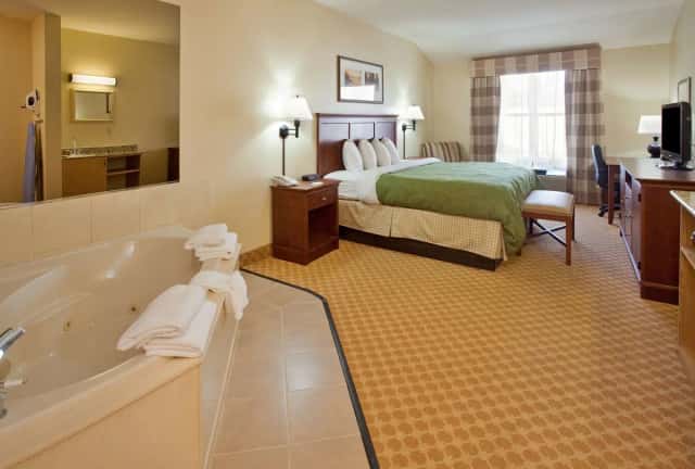 Jetted bathtub at Country Inn & Suites by Radisson, Birch Run-Frankenmuth, MI