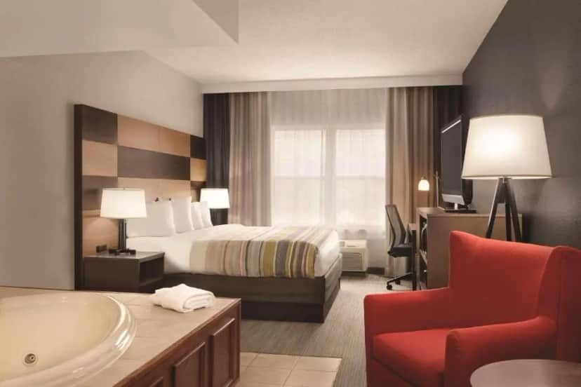 Private in-room jacuzzi tub in the King Room with Whirlpool - Non-Smoking at Country Inn & Suites By Radisson Boone Nc