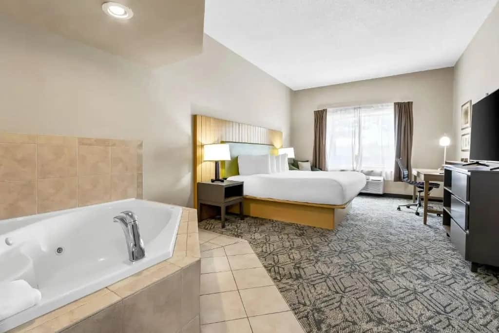 Private in-room jacuzzi tub in the King Suite with Whirlpool at Country Inn & Suites by Radisson, Charleston North, SC