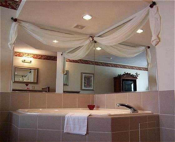 Deep soaking bathtub at Country Inn & Suites by Radisson, Effingham, IL