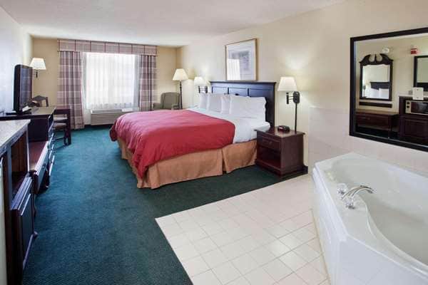 Private in-room jacuzzi tub at Country Inn & Suites by Radisson, Hiram, GA