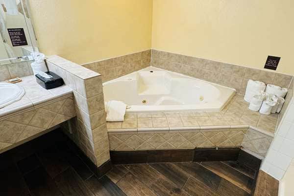 Private in-room jacuzzi tub at Country Inn & Suites by Radisson, Mishawaka, IN