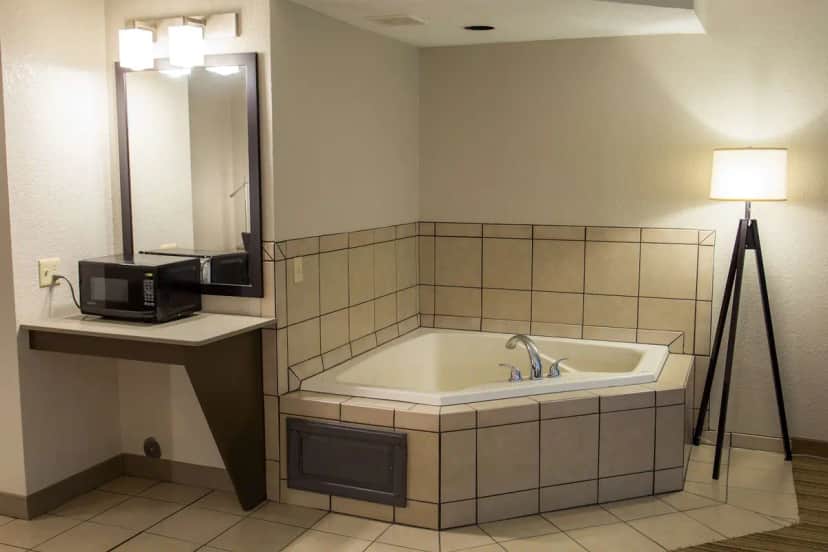 Private in-room jacuzzi at Country Inn & Suites by Radisson, Platteville, WI