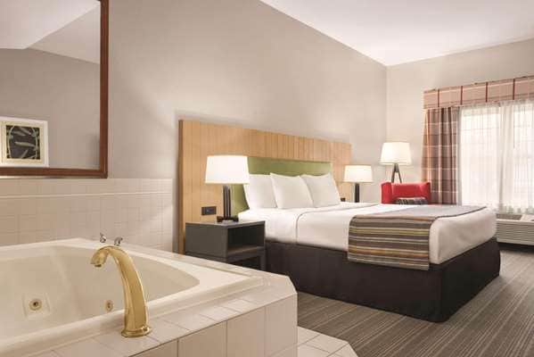 Private in-room jacuzzi tub at Country Inn & Suites by Radisson, Schaumburg, IL
