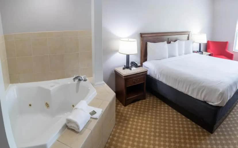 Private in-room jacuzzi tub in the King Suite with Whirlpool - Non smoking at Country Inn & Suites by Radisson, Wilmington, NC