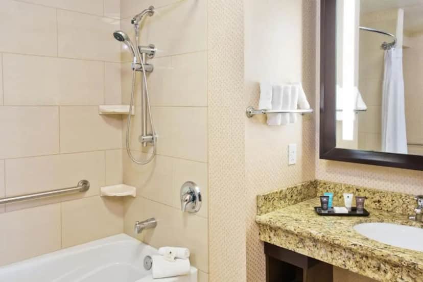 Private in-room jacuzzi tub in the One-Bedroom Suite with Tub - Communications Access at Crowne Plaza Anchorage-Midtown, an IHG Hotel