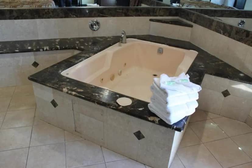 Private in-room jacuzzi tub in the King Room with Spa Bath Non Smoking at Crystal Inn Suites & Spas