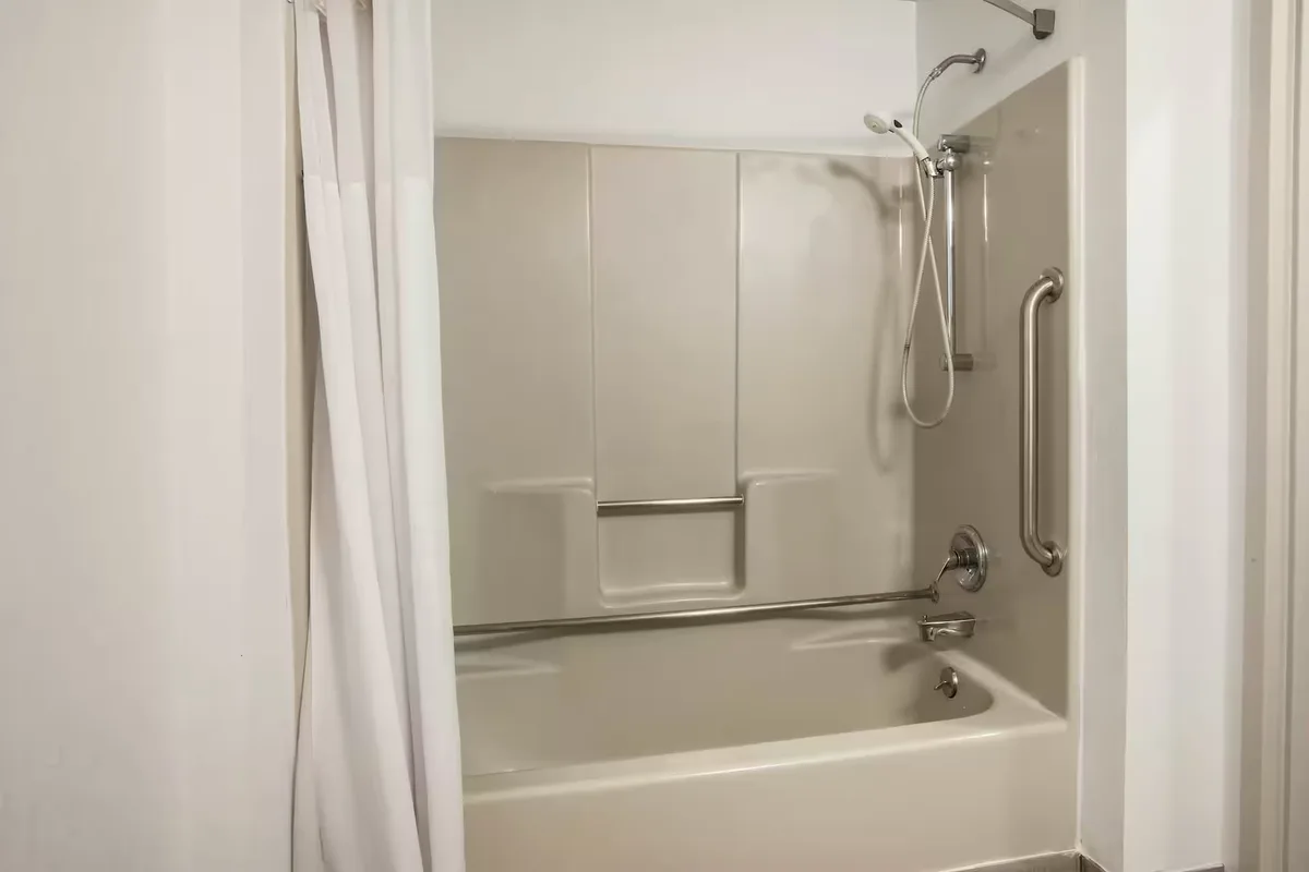 Deep soaking bathtub at Days Inn & Suites by Wyndham Rochester Hills MI
