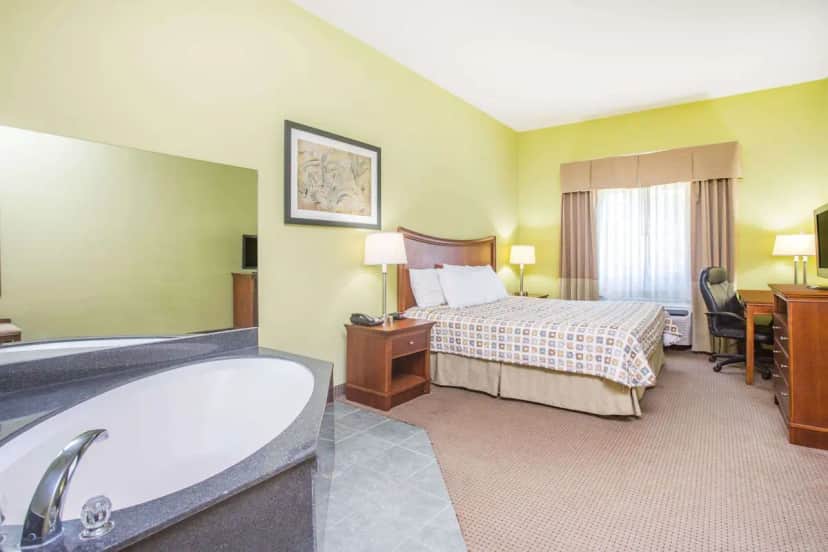 Deep soaking bathtub at Days Inn & Suites by Wyndham Swainsboro
