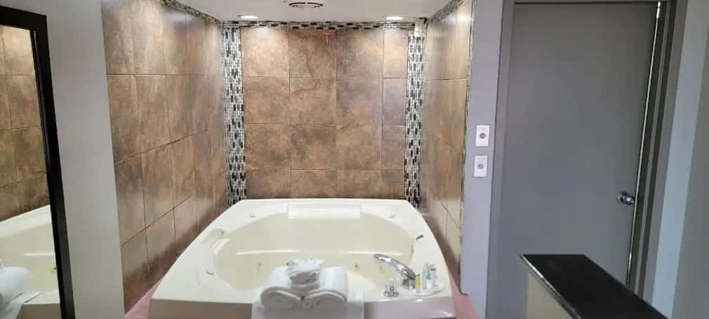 In-room hot tub at Days Inn By Wyndham Conway in Conway, AR