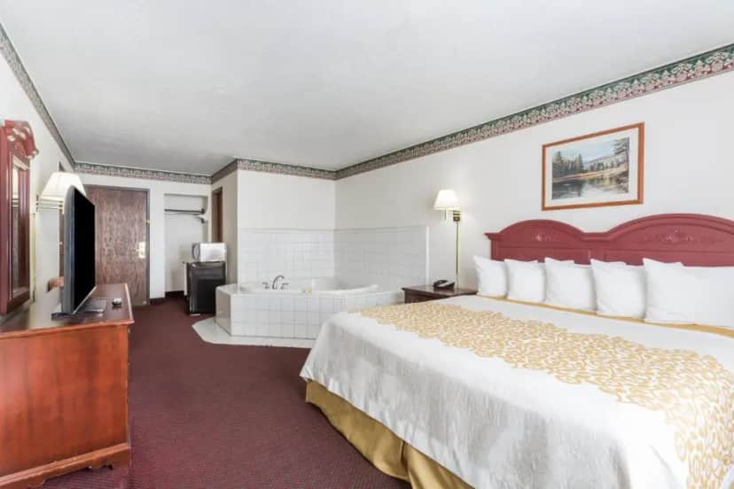 Private in-room jacuzzi in the Deluxe King Suite at Days Inn by Wyndham Evanston WY