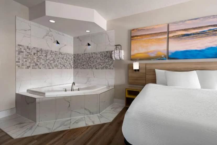 Private in-room jacuzzi tub in the King Studio Suite with Jacuzzi - Non-Smoking at Days Inn by Wyndham Greenville South/Mauldin