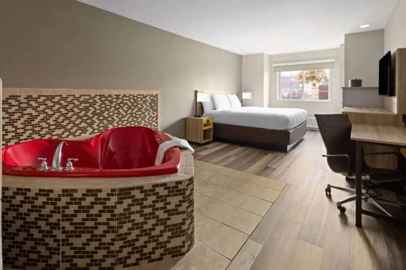 Private in-room jacuzzi in the Deluxe King Room - Non-Smoking at Days Inn by Wyndham Jackson Downtown