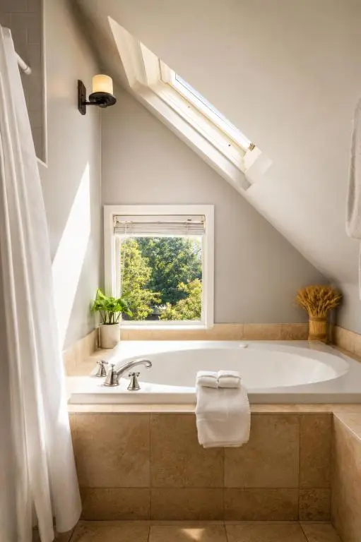 Private in-room jacuzzi tub in the Penthouse Suite (1 King Bed) at De La Vina Inn