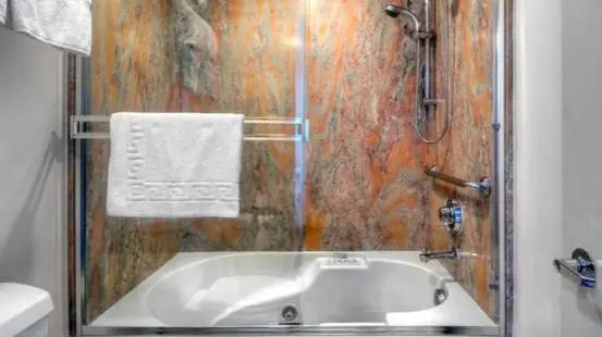 Private in-room jacuzzi tub in the King Suite with Spa Bath at Dinah’s Garden Hotel