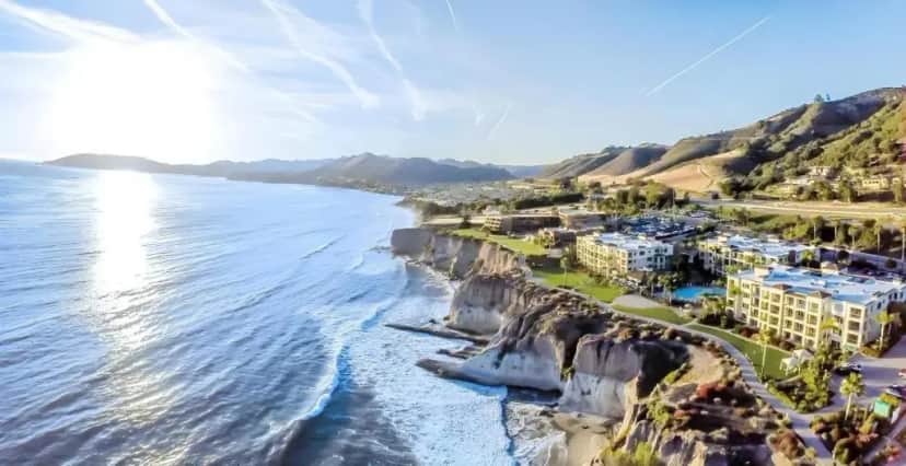 an aerial view of the cliffs next to the ocean at Dolphin Bay Resort and Spa in Shell Beach