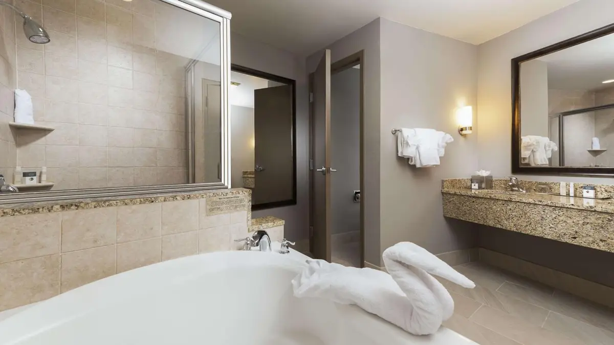 Private in-room jacuzzi tub in the King Suite with Whirlpool at DoubleTree by Hilton Hotel West Palm Beach Airport