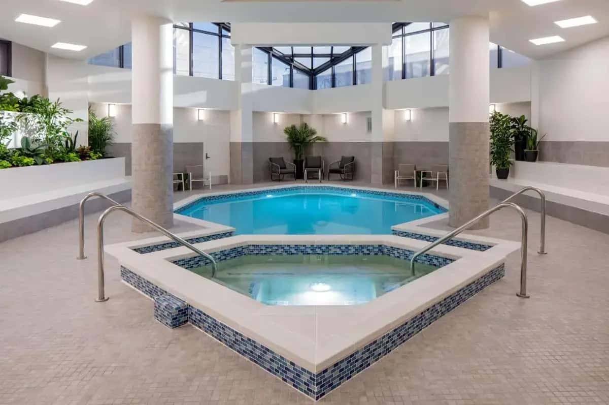 a hot tub in a large room with a building at Doubletree Suites by Hilton Salt Lake City in Salt Lake City