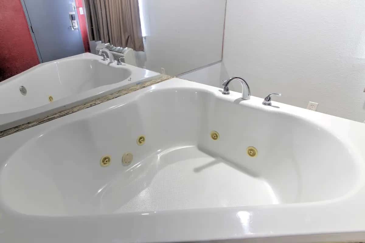 Private in-room jacuzzi tub at Econo Lodge Airport