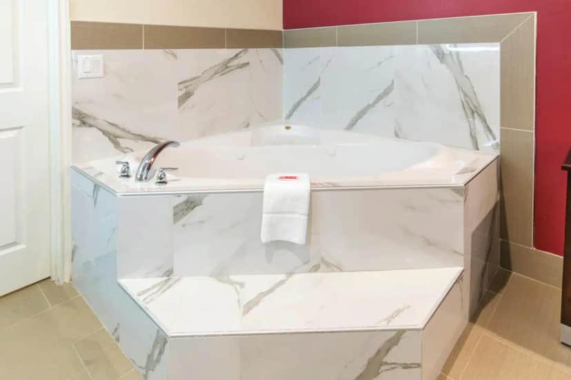 Private in-room jacuzzi tub in the King Suite with Whirlpool at Econo Lodge Inn & Suites Houston Willowbrook