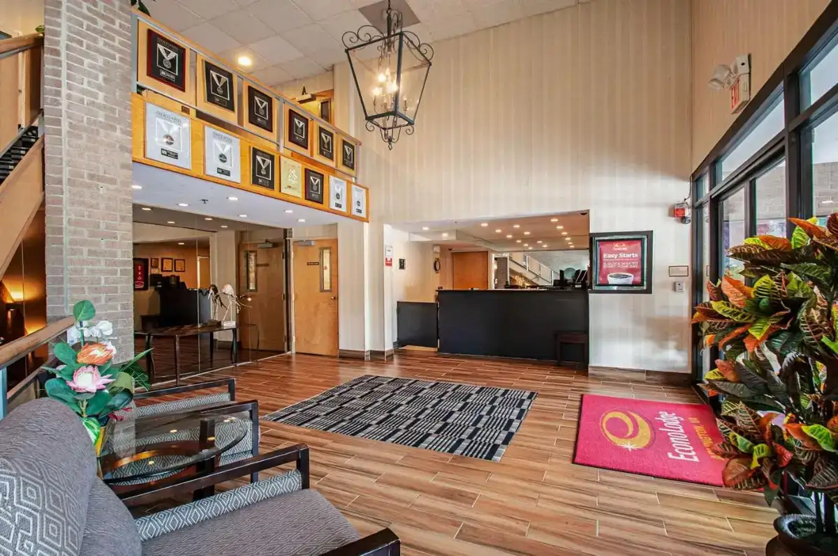 a lobby of a store with a waiting room at Econo Lodge Metro in Arlington