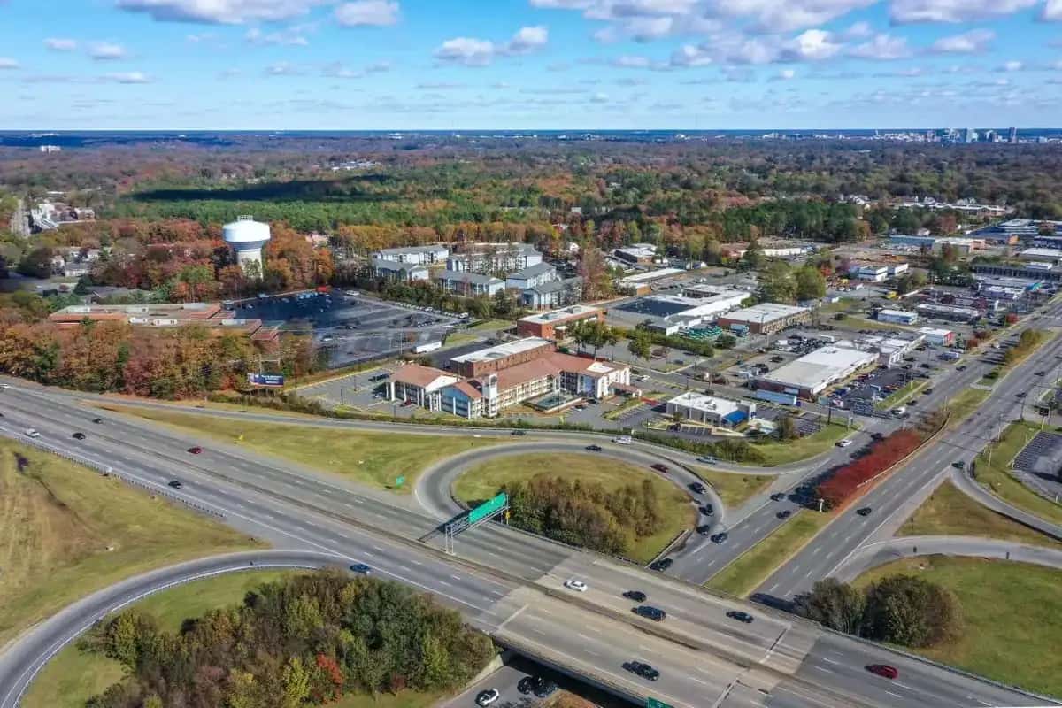 an aerial view of a city with a highway at Econo Lodge Richmond-North Chesterfield in Richmond