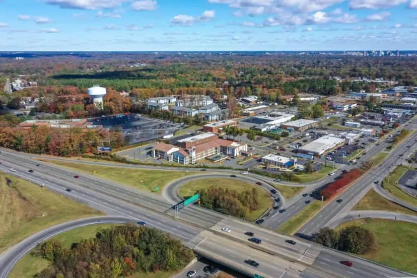 an aerial view of a city with a highway at Econo Lodge Richmond-North Chesterfield in Richmond