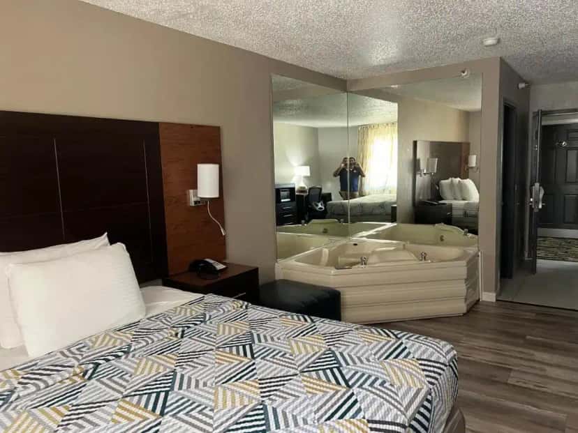 In-room hot tub at Economy Suites - Tulsa Airport in Catoosa, OK