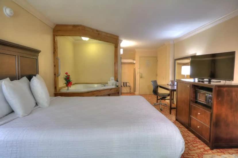 Private in-room jacuzzi in the Queen Room with Hot Tub - Non-Smoking at Edgewater Hotel & Conference Center