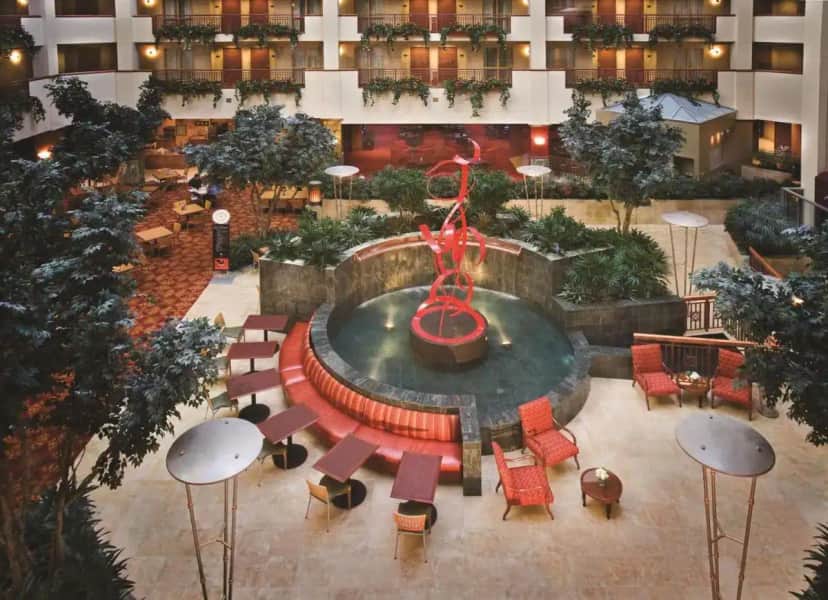 an aerial view of a hotel lobby with a fountain at Embassy Suites Northwest Arkansas - Hotel, Spa & Convention Center in Rogers