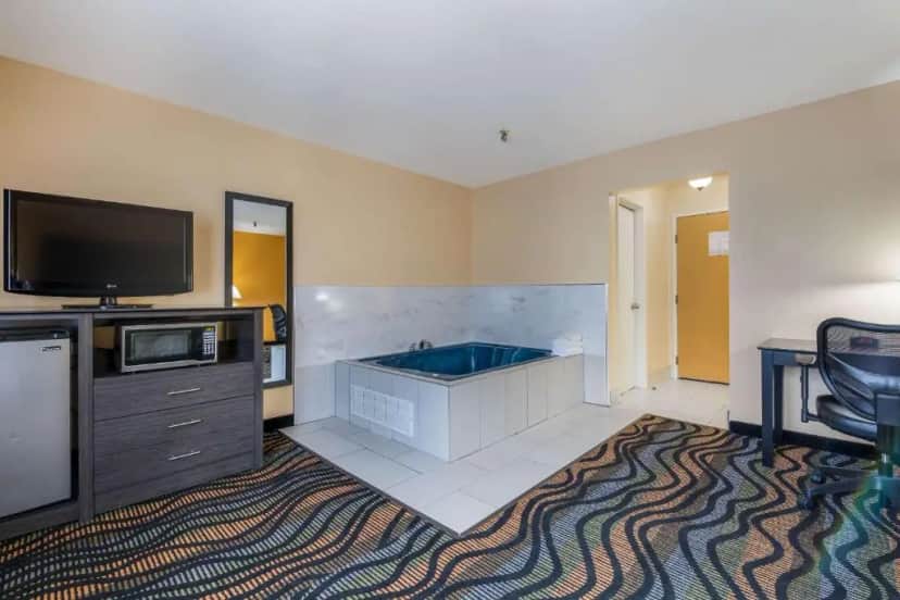 Private in-room jacuzzi in the Standard King Room with Whirlpool - Non Smoking at Equality Inn
