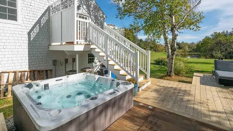 In-room hot tub at Farm Road Estate in Dover, VT
