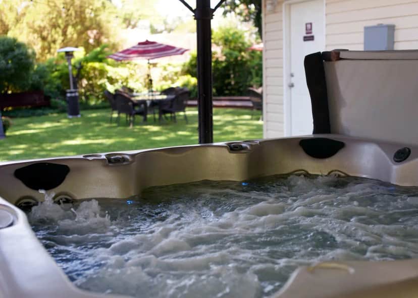 Private outdoor hot tub at Fiddler's Inn
