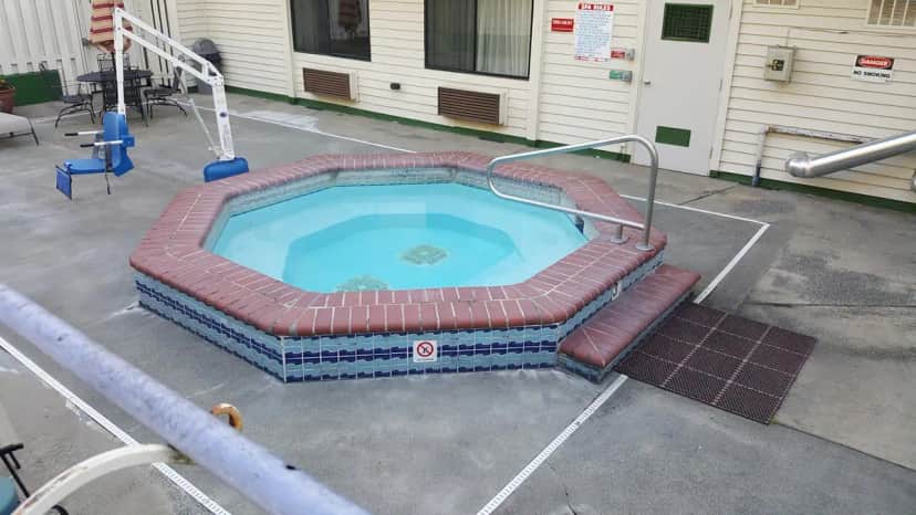 Shared outdoor hot tub at GuestHouse Poulsbo